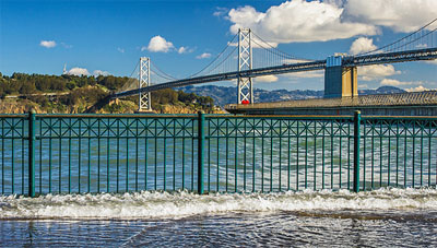 Overtopping Embarcadero, San Francisco, during king tide. Courtesy California Coastal Commission, Photo © Mike Filippoff
