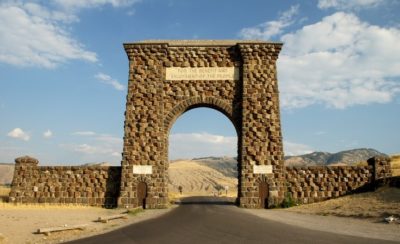 The Roosevelt Arch, marking the northern entrance to Yellowstone National Park.