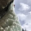 Responding to climate change is more perilous than climbing a frozen waterfall in the sun, and requires even more fortitude and balance. Photo Mike Kiparsky.