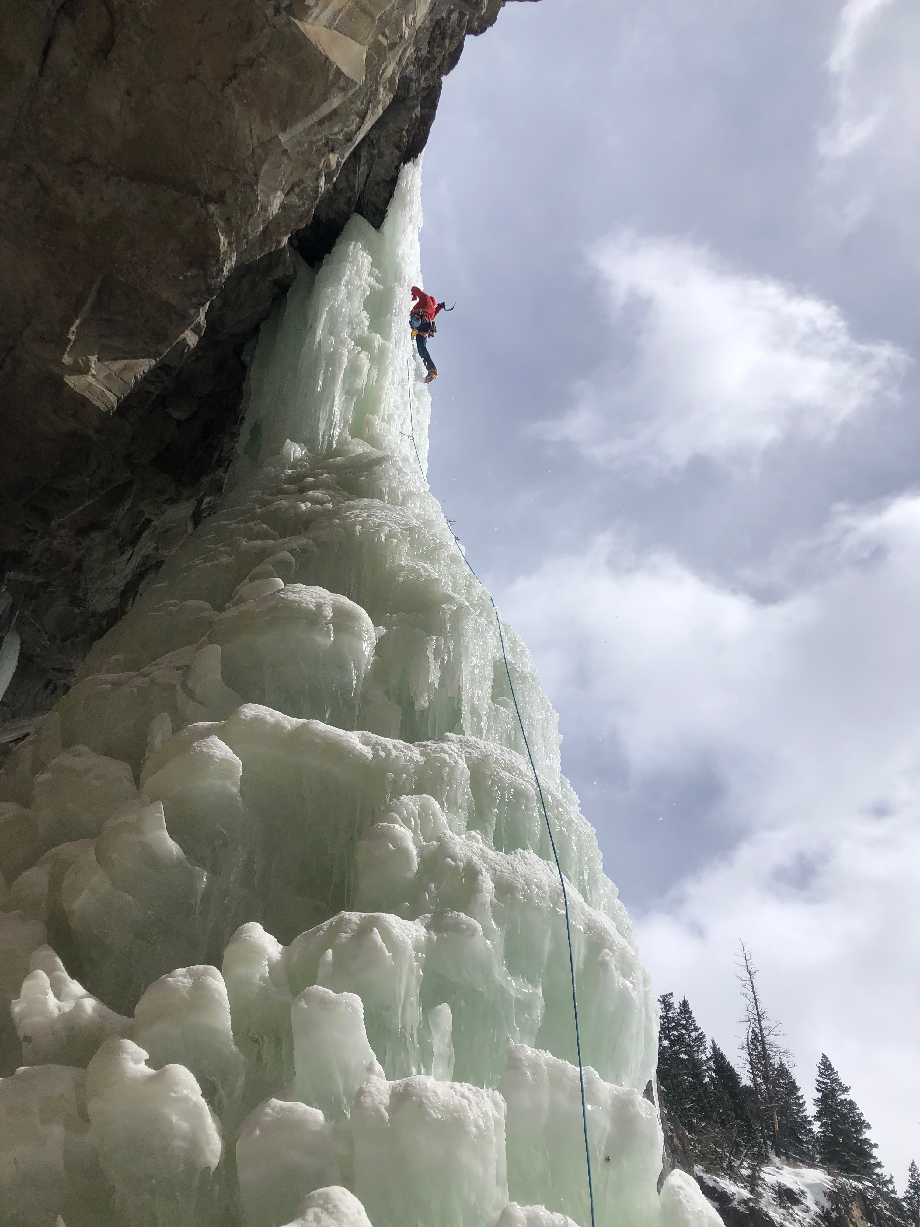 Responding to climate change is more perilous than climbing a frozen waterfall in the sun, and requires even more fortitude and balance. Photo Mike Kiparsky.