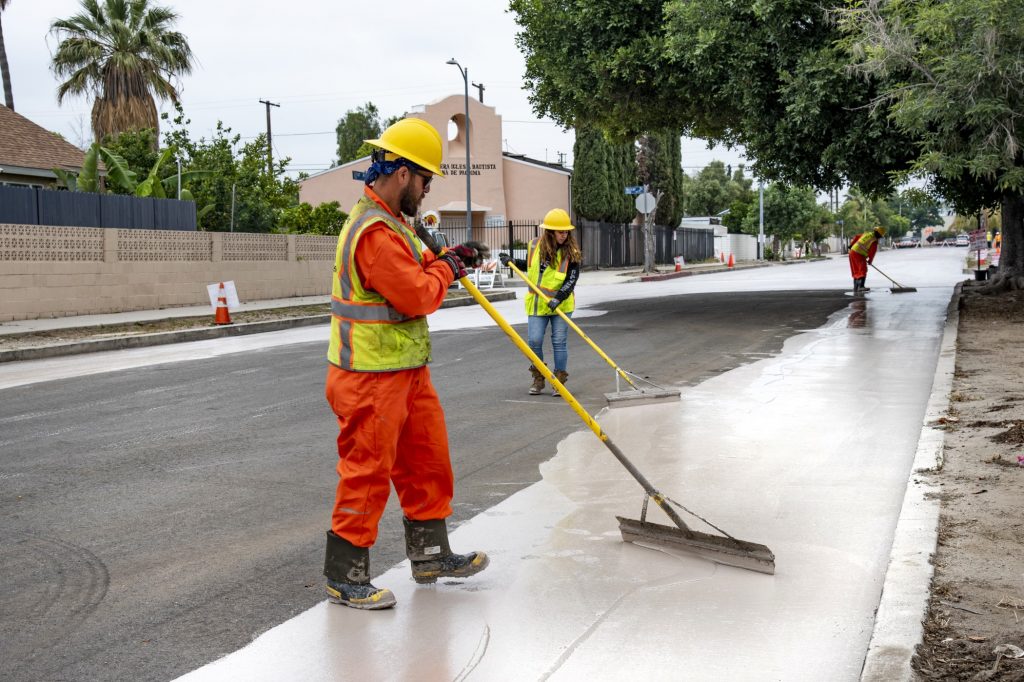 Los Angeles city workers install cool streets in Pacoima. Photo credit: City of Los Angeles Bureau of Street Services