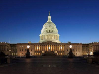 An image of the U.S. Capitol Building in the evening.