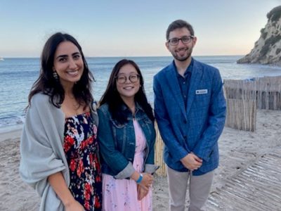 Emmett Institute fellows Heather Dadashi (left) and Andria So (center) with LA Waterkeeper staff attorney and former fellow Benjamin Harris at the nonprofit's annual fundraiser in Malibu. 