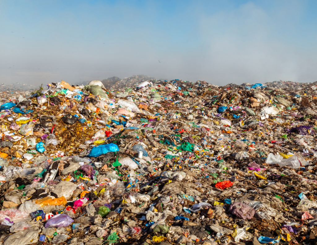 A pile of trash at a landfill