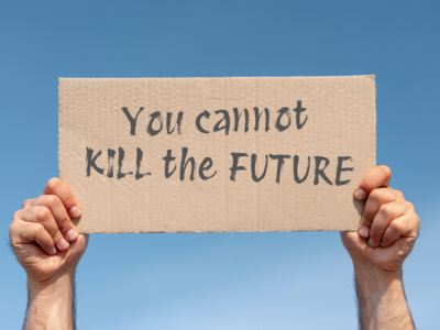 A protest sign that says You Cannot Kill the Future