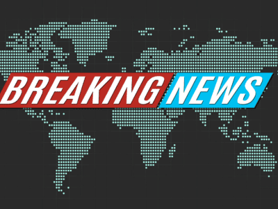 A map of the US with a Breaking News chyron in front of it