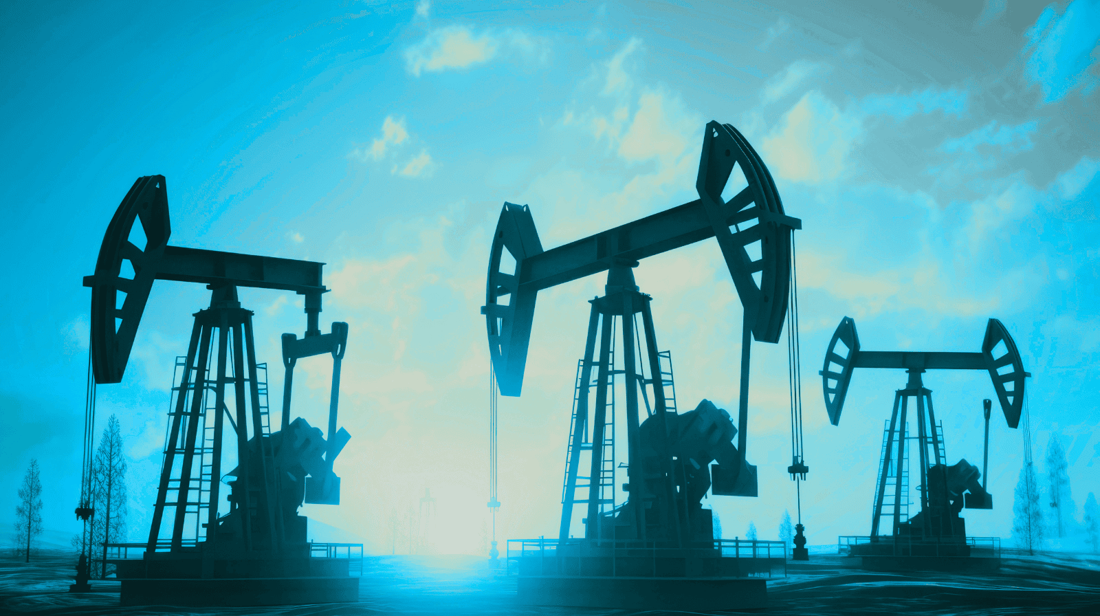 Three oil pumpjacks operate in a row on a barren landscape under a blue sky with scattered clouds, silhouetted by the setting or rising sun in the background.