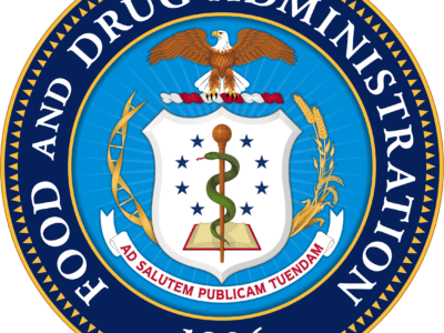 The official seal of the Food and Drug Administration, featuring a bald eagle above a shield with a serpent-entwined rod, surrounded by the agency name and the date 1906.